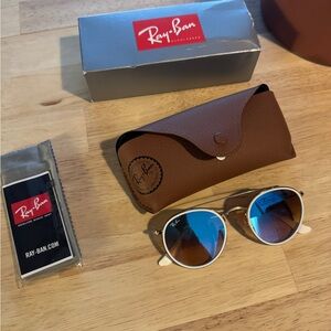 New Ray Ban round double bridge - polished Arista gold with blue flash lens